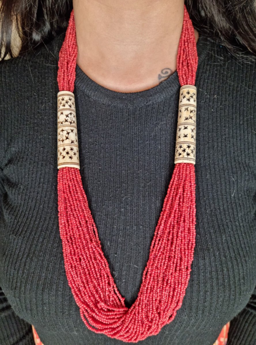 Glass-Bead & Carved-Bone Tribal Fluted Necklace in black - Ekobae